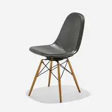 PKW-1 by Charles and Ray Eames, Naugahyde, enameled steel, birch, sold May 2025
