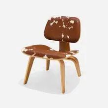 Select Edition LCW by Charles and Ray Eames, 1945 / 2008, ash plywood, cowhide, rubber, sold May 2025