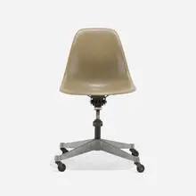 PSCC chair by Charles and Ray Eames, c. 1960, molded fiberglass, cast aluminum, lacquered steel, sold May 2025