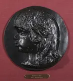 Pierre-Auguste Renoir, MEDALLION DE COCO, numbered 307/350, Bronze with dark brown patina, reproduction casting