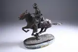 TROOPER OF THE PLAINS, later casting by Frederic Remington, Bronze with brown patina, on a green stone base. - Height : 13 1/4 in., overall PROVENANCE: Estate of Franklin O, sold Sep 2008