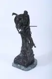 MOUNTAIN MAN, later casting by Frederic Remington, Bronze with dark brown patina on a green stone base - Height: 29 in., overall PROVENANCE: Estate of Franklin O, sold Sep 2008