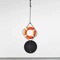 Lifesaver Manhole by Allora & Calzadilla, 2011, cast silicon, bronze and polyurethane paint, sold Oct 2021