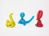 Jeff Koons, Balloon Swan (Yellow); Balloon Monkey (Blue); and Balloon Rabbit (Red), 2017, Three porcelain multiples painted in chrome, all contained in the original foam lined boxes with silver printed signature