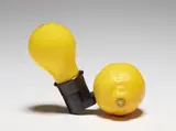 Joseph Beuys, Capri-Batterie (Capri Battery) (S. 546), 1985, Multiple comprising light bulb (Mazda) with manufacturer's inkstamp, plug socket, and exchangeable lemon, all contained in the original wooden box with yellow printed title