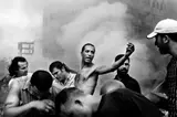 Paolo Pellegrin, Civilians sift through the rubble looking for survivors following an Israeli air raid. Beirut, Lebanon from Double Blind, 2006, Gelatin silver print