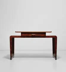 Desk by Gio Ponti, early 1930s, Curl walnut-veneered wood, painted wood, brass, sold Jun 2021
