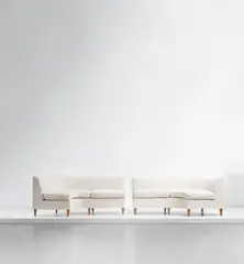Pair of modular sofas by Gio Ponti, circa 1951, Fabric, walnut, sold Jun 2021