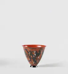 Small footed vase by Jean Dunand, circa 1922, Lacquered copper, sold Jun 2021
