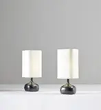 Jacques Ruelland and Dani Ruelland, Two table lamps, circa 1960, Glazed earthenware, fabric shades