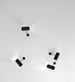 Serge Mouille, Set of four adjustable ‘Tuyau’ wall lights, circa 1955, Painted aluminium, brass, painted steel