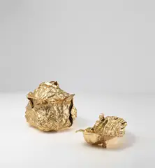 Gabriella Crespi, 'Cavolo' ice bucket and 'Foglia cavolo con lumache' bowl, from the 'Cesello' series, circa 1970, Gilded brass