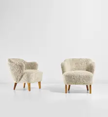 Flemming Lassen, Pair of armchairs, circa 1940, Sheepskin, birch
