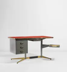 Desk by Gio Ponti, circa 1955, Plastic-laminated plywood, brass, painted steel, rubber, sold Jun 2021