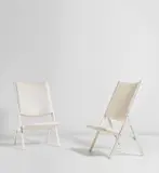 Gio Ponti, Pair of folding chairs, from the ‘Apta’ series, circa 1970, Painted wood, vinyl
