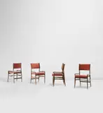 Gio Ponti, Set of four dining chairs, model no. 676, circa 1954, Stained walnut, vinyl, brass
