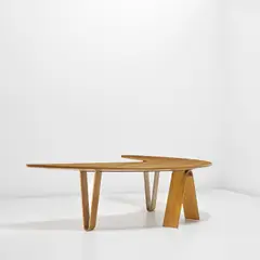 André Bloc, Free-form Boomerang desk, designed for the Villa Bellevue, Meudon, France, circa 1951, Oak, oak-veneered wood