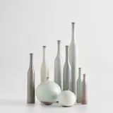 Jacques Ruelland and Dani Ruelland, Group of seven vases from the 'Bouteilles' series and two vases from the 'Boules' series, circa 1975, Glazed earthenware