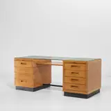 Desk by Gio Ponti, circa 1939, Oak-veneered wood, oak, painted wood, rubber-covered metal, glass, sold Nov 2021