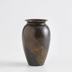 Vase by Jean Dunand, circa 1915, Patinated copper, sold Nov 2021