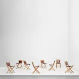 Set of eight 'Folding Chairs' by Gabriella Crespi, circa 1973, Bamboo, brass, leather, sold Nov 2021