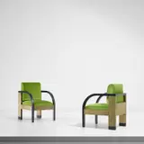 Pair of armchairs, from the Palazzo Gualino, Turin by Gino Levi Montalcini and Giuseppe Pagano, circa 1928, Buxus-covered wood, painted wood, fabric, offered Nov 2021