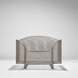 'How High the Moon' armchair by Shiro Kuramata, 1986, Nickel-plated steel mesh, sold Nov 2021