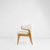 Armchair, designed for the first class reading and writing room of the 'Oceania' ocean liner by Gio Ponti, circa 1951, Chestnut, brass, fabric, sold Nov 2021