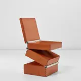Rare ‘Box in Four Movements’ chair by Ron Arad, 1994, Cherry-veneered wood, stainless steel, sold Nov 2021
