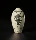 Shoji Hamada, Early vase, circa 1922, Stoneware, white slip with iron slip painted and carved Crysanthemum design beneath a white glaze