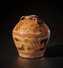 Large jar with handles by Michael Cardew, circa 1930, Earthenware, layered slips and glazes with incised designs, sold Nov 2021