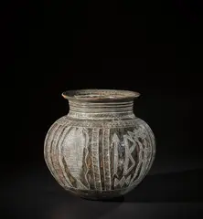 Ladi Kwali, 'Aeroplane Water Pot', 1962, Stoneware, mottled iron glazes over incised zoomorphic and aeroplane designs within impressed textured bands inlaid with white slip