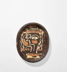 Thomas 'Sam' Haile, Dish with surrealist design, circa 1946, Earthenware, trailed and brushed slips beneath a crawling clear glaze