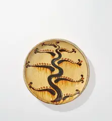 Early dish with tree by Bernard Leach, circa 1930, Earthenware, painted coloured slips beneath a clear galena glaze, sold Nov 2021