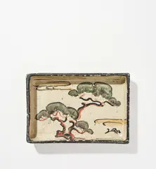 Bernard Leach, Early rectangular dish in the style of Ogata Kenzan, circa 1920, Raku fired with a painted design of pine trees in a landscape