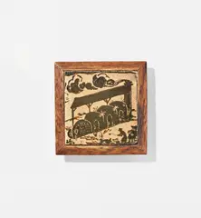 Framed tile with design of climbing kiln by Bernard Leach, circa 1935, Stoneware, painted slips with carved designs beneath a clear glaze, mounted in an oak frame, sold Nov 2021