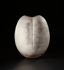 Hans Coper, Monumental ovoid pot, 1968, Stoneware, layered porcelain slips and engobes over a textured surface, a deep vertical indent to each face, the interior with a manganese glaze