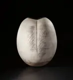 Hans Coper, Monumental ovoid pot, 1968, Stoneware, layered porcelain slips and engobes over a textured surface, a deep vertical indent to each face, the interior with a manganese glaze