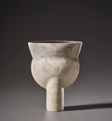 'Thistle' form by Hans Coper, circa 1965, Stoneware, layered porcelain slips and engobes over a textured and incised body, the rim and interior with a manganese g, sold Nov 2021