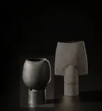Hans Coper, Cup on stand, circa 1975, Stoneware, black glaze over a textured body, the interior with a stem holder