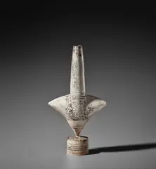 Hans Coper, ‘Cycladic’ arrow form, circa 1972, Stoneware, layered porcelain slips and engobes over a textured and incised body, the interior with a manganese glaze