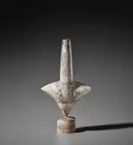 ‘Cycladic’ arrow form by Hans Coper, circa 1972, Stoneware, layered porcelain slips and engobes over a textured and incised body, the interior with a manganese glaze, sold Nov 2021