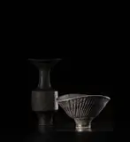 Lucie Rie, 'Black firing' bowl, 1981, Stoneware, over-fired black glaze over a body with carved fluted design