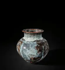 Ladi Kwali, Water pot, circa 1962, Stoneware, flowing glazes, incised zoomorphic designs inlaid with white slip