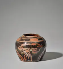 Kenkichi Tomimoto, Jar, 1932, Stoneware, layered tenmoku over iron glazes with a resist design of crysanthemums