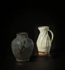 Pitcher by Shoji Hamada, circa 1960, Stoneware, white 'Nuka' glaze over spiraling ribs, sold Nov 2021