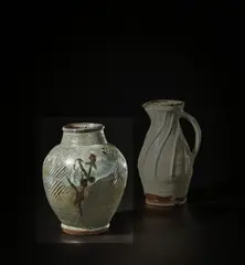 Jar by Shoji Hamada, circa 1955, Stoneware, layered pewter glazes with painted stem leaf designs, the body with diagonal paddled texture, sold Nov 2021