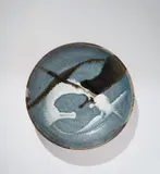Shimaoka Tatsuzo, Large dish, circa 1990, Stoneware, cord impressed spiralling texture inlaid with blue beneath white and iron poured splashes