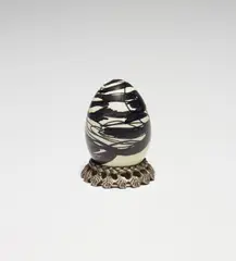 Aleksandra Mir, Fabergé Egg, 2004, felt-tipped pen on chicken eggshell with metal stand