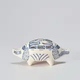 Grayson Perry, Piggy Bank, 2017, White ceramic piggy bank painted in blue and glazed, with rubber stopper, contained in the original cardboard box